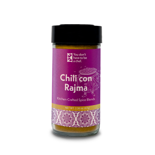 A bottle of Chili Con Rajma spice blend. Crafted for making authentic Indian Rajma, with kidney bean and rich, aromatic Indian spices.