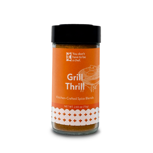 A Bottle of Grill Thrill Mediterranean spice blend. For grilling or pan-searing meats and fish with bold, savory flavors.