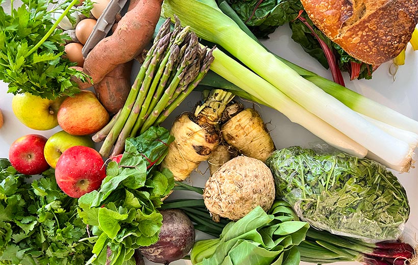 Fresh vegetables and fruits from local farmer's market before cooking.